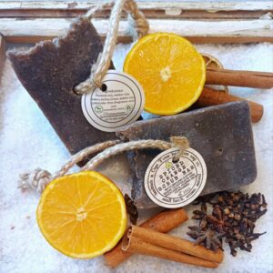 Spiced sweet orange scrub bar with ground coffee beans